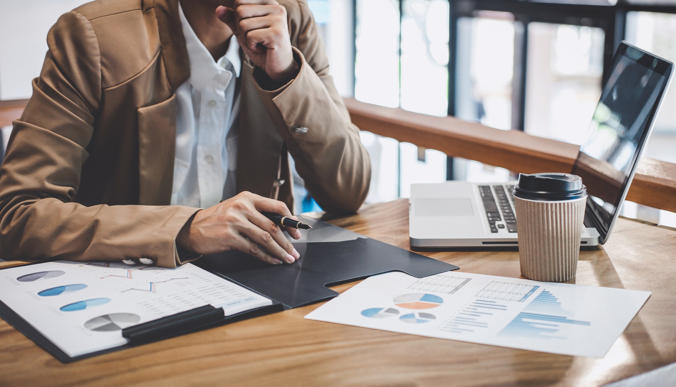 Entrepreneur business woman typing on laptop at workplace, Women working in office with using a laptop and document report
