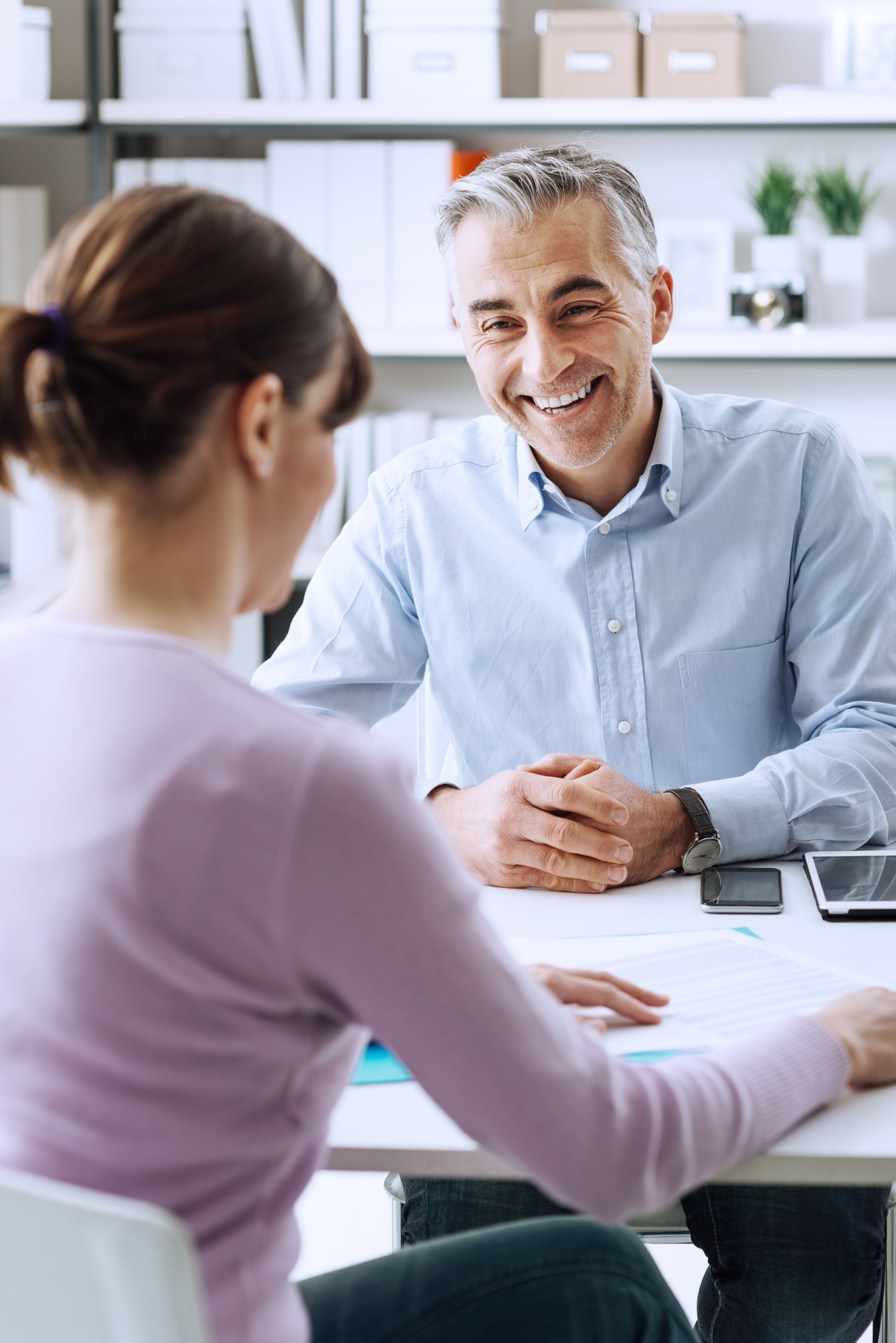 vertical image_client meeting_male_iStock-512056730_resized web image-1