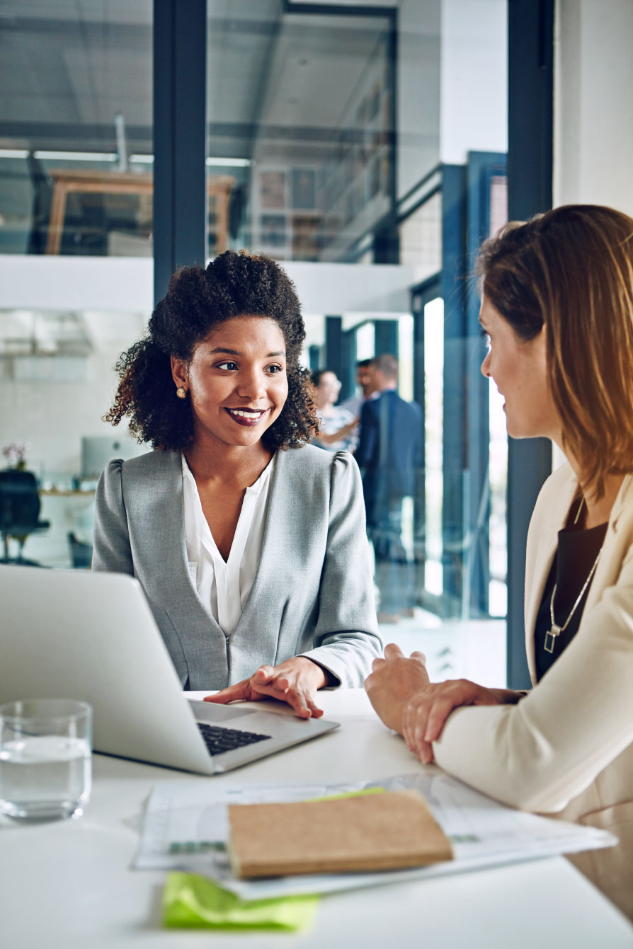 vertical-image_client-or-business-meeting-with-laptop_iStock-671352964_resized-web-image_v2