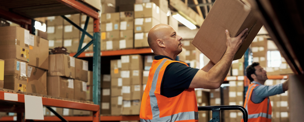 Man stacking boxes