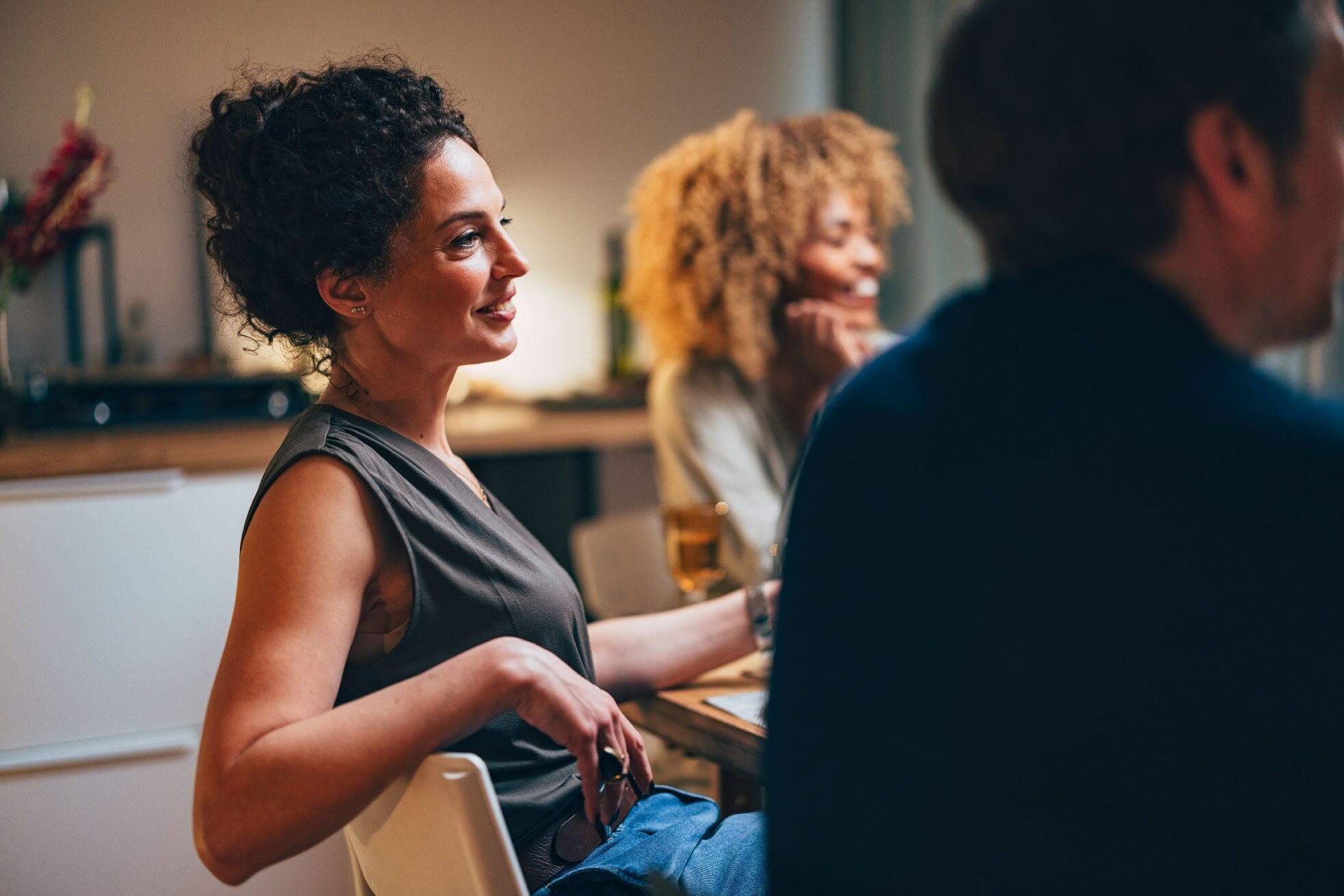 group-of-people-sitting-at-a-tab