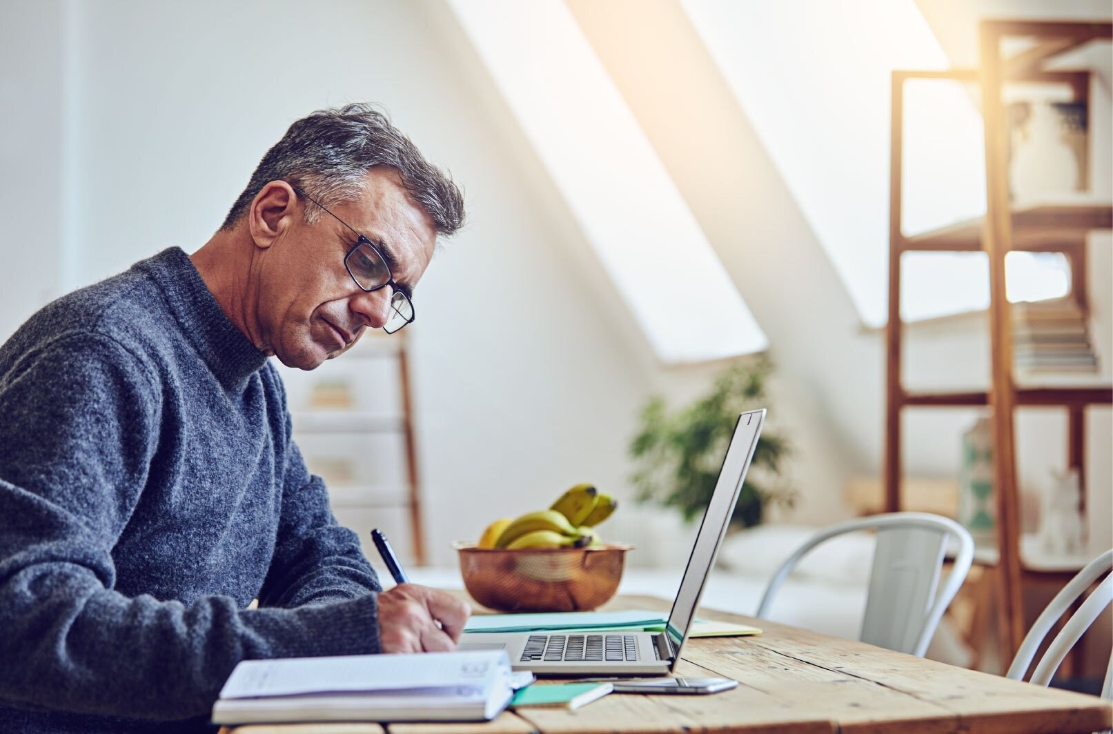 man-on-laptop_doing-paper-work-a-1