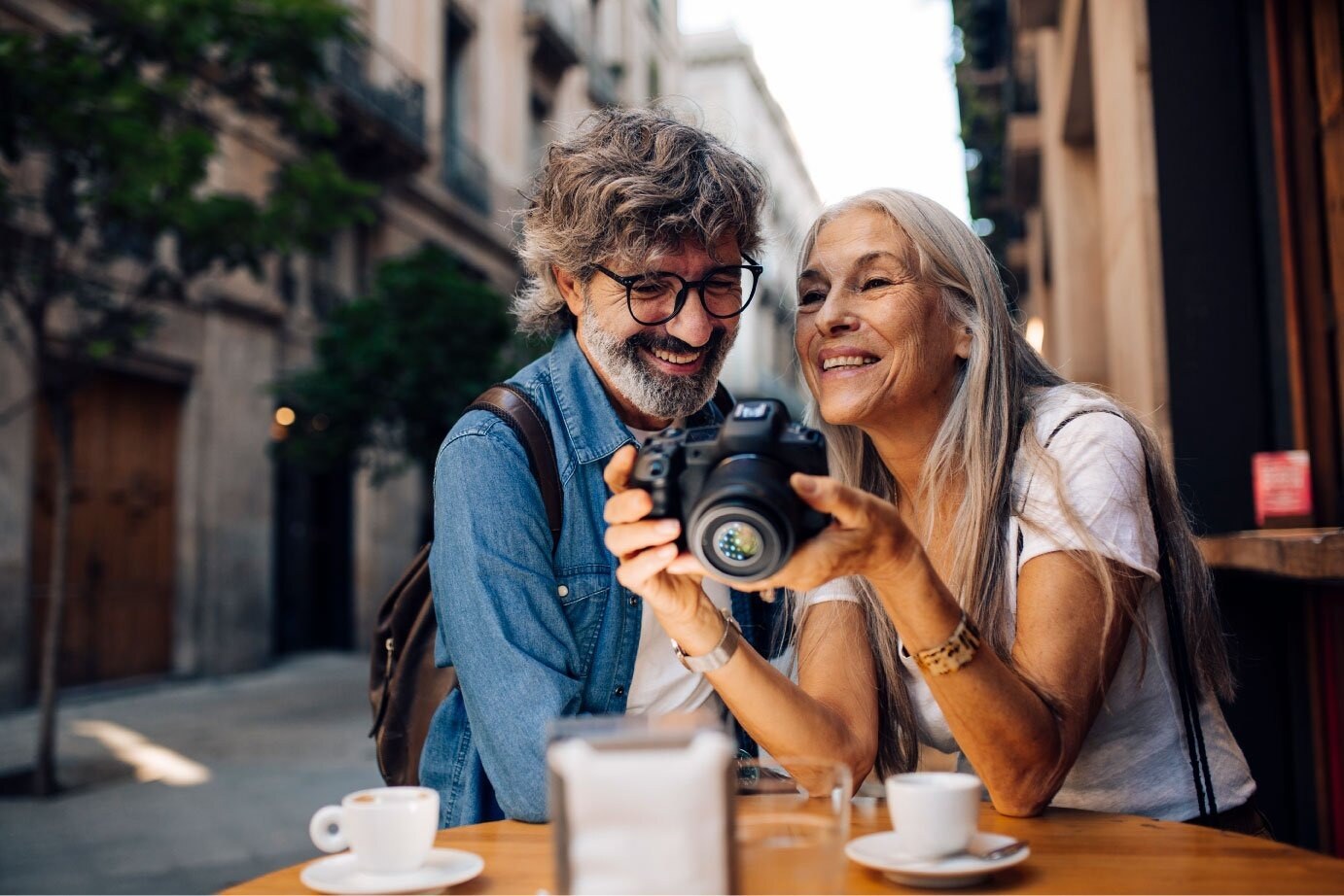 older-couple-on-holiday-at-cafe